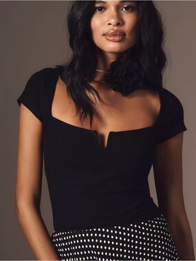 Reformation Emely Top. In new condition without tags.